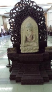 Buddha on teak seat